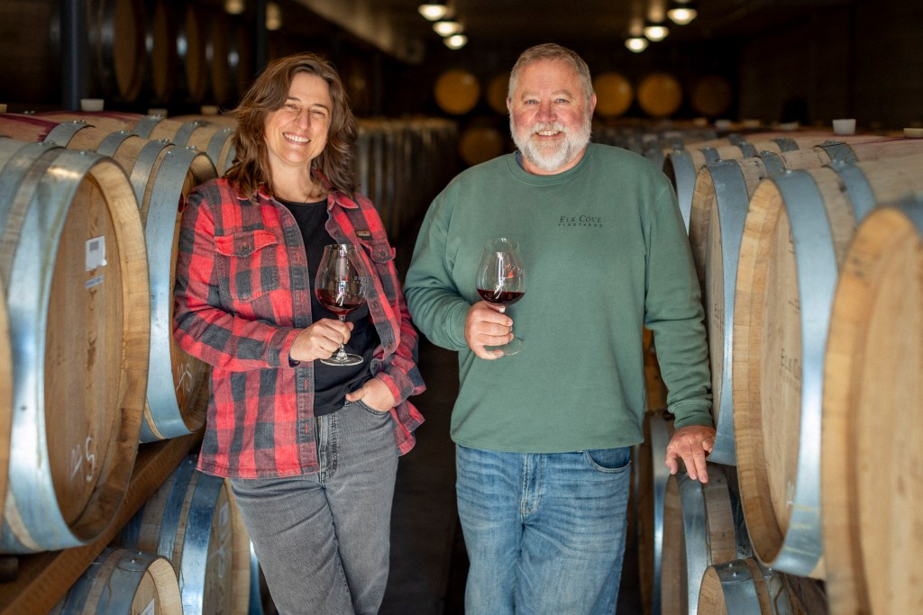 Adam and Anna Campbell in the wine cellar